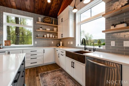 Interior of kitchen area showcasing a personalized farmhouse sink